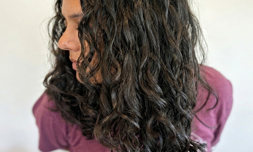 Image 3: Custom Curly Cuts, Vibrant Color, & Smooth Blowouts for All Hair Types