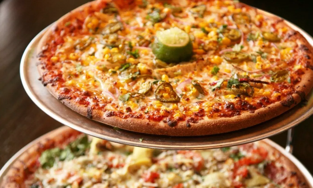 $20 Worth of Food and Drink or Cheese Bread, Pizzas, Dessert, and Soda