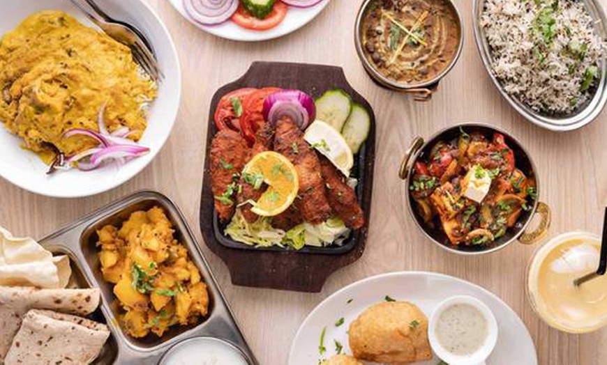 Image 1: Four-Course Vegetarian Indian Meal With a Drink Each For Two or Four
