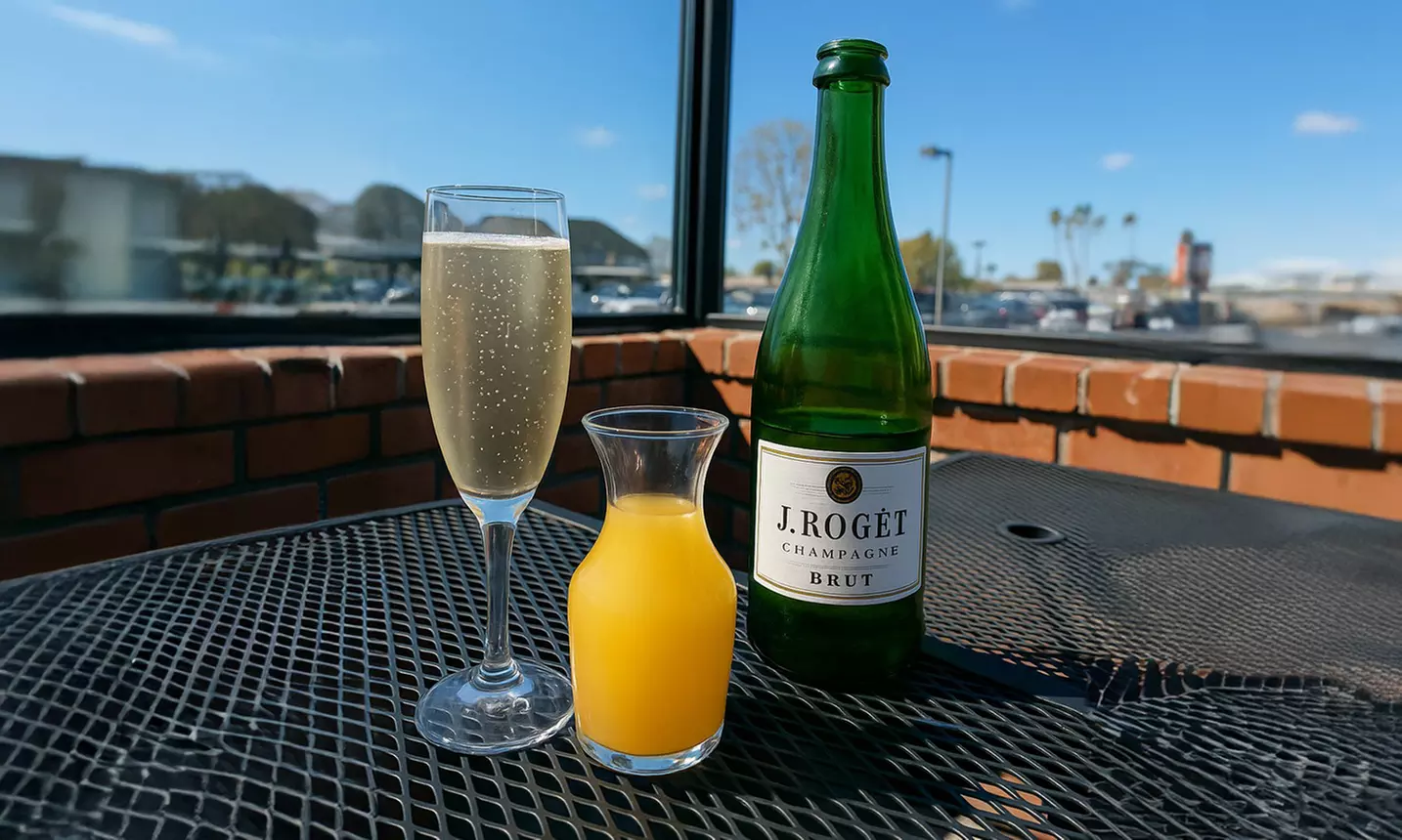 Get $100 Towards Food & Drink or Date Night Dinner w/ a Bottle of Wine 