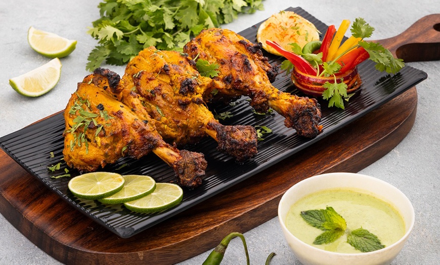 Image 5: Voucher Worth AED 100 or AED 150 to Spend on Anything Off the Menu 