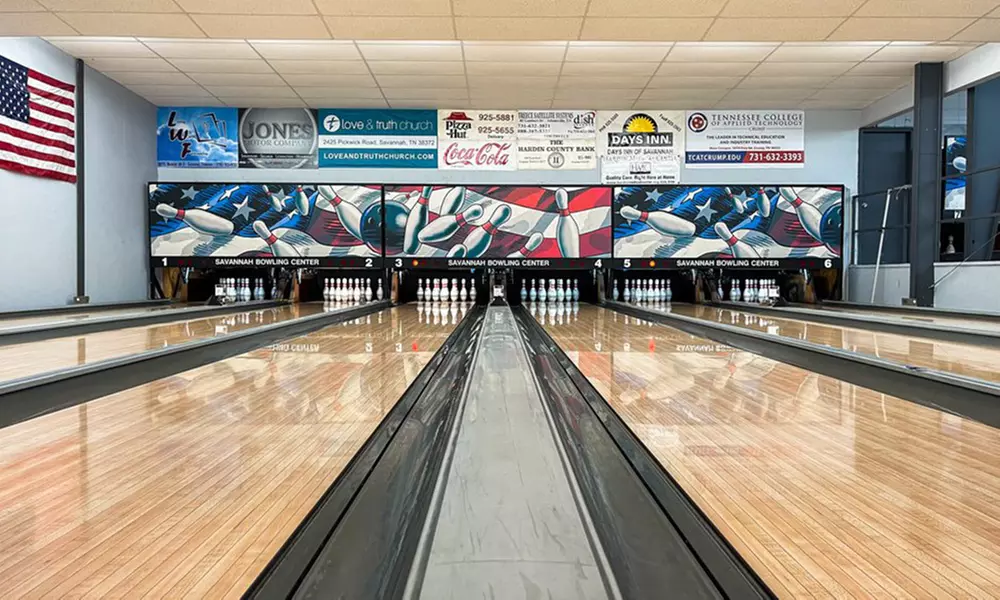 Two Games of Bowling, Shoe Rental, and Arcade Credits to Share