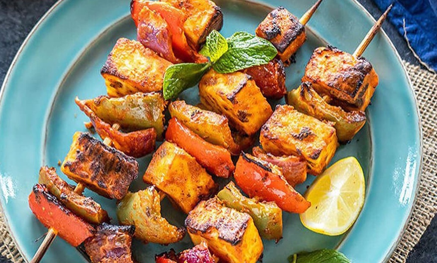 Image 1: Up to $100 in Food and Drink Options at Nawab's Indian Restaurant