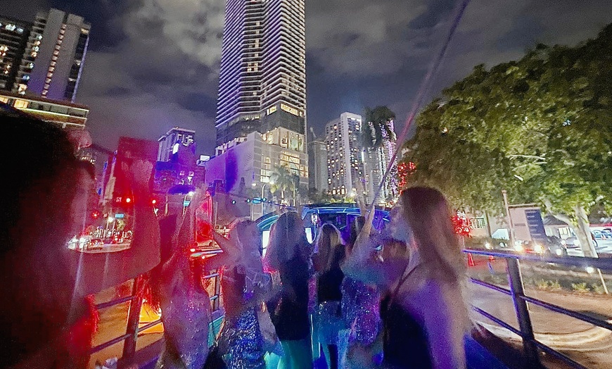 Image 4: Enjoy 1.5-Hours Open-Air Party Bus Tour with Guide & Iconic Views