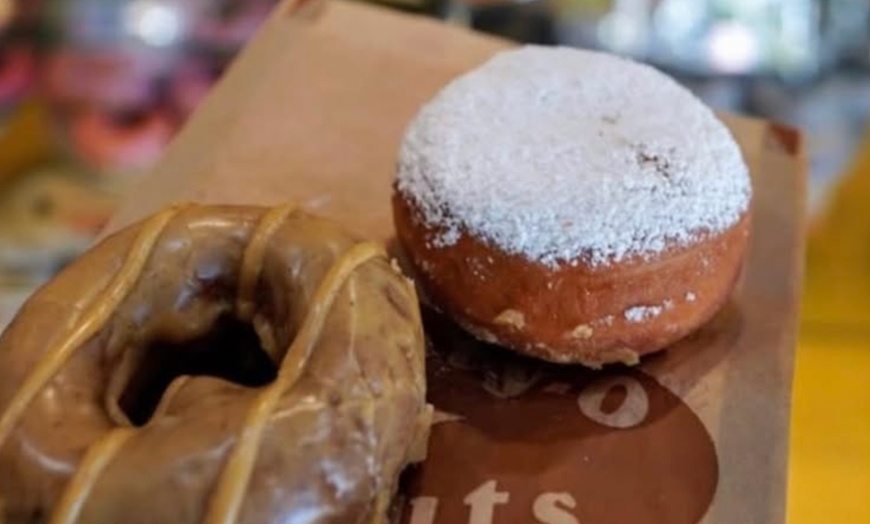 Image 17: Up to a Dozen Donuts, 4 Donuts & 2 Drinks or $50 to Spend