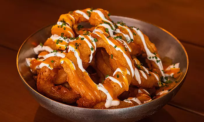 Menú cervecero con pizza o burger para 2 o 4 en zona Alonso Martínez