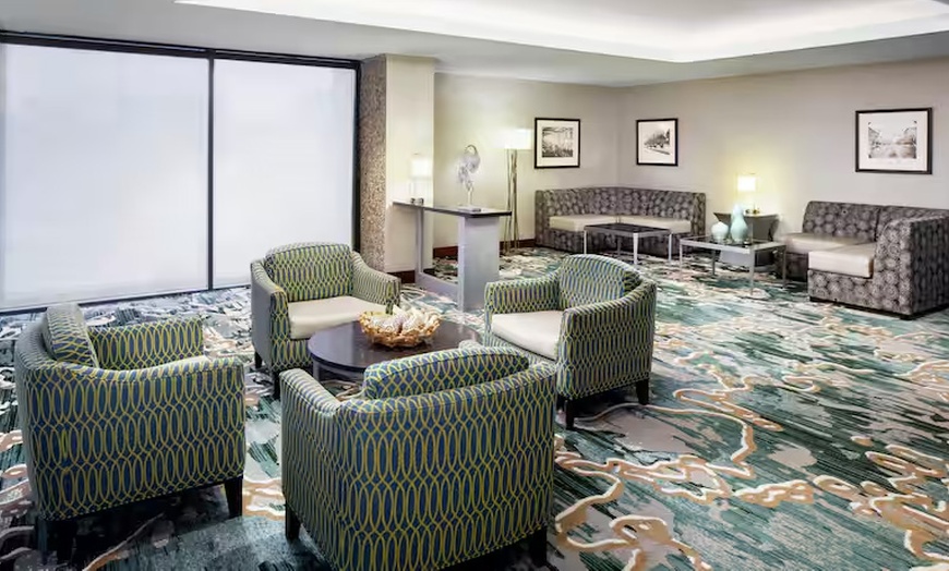Image 5: Modern 4-Star Stay w/ Pool, Dining, & SNHU Arena Convenience