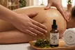 Relax with 50' or 80' Signature Body Flow, Deep Tissue, CBD Oil, or Hot Stone Massages (Up to 61% Off) - Second Medium