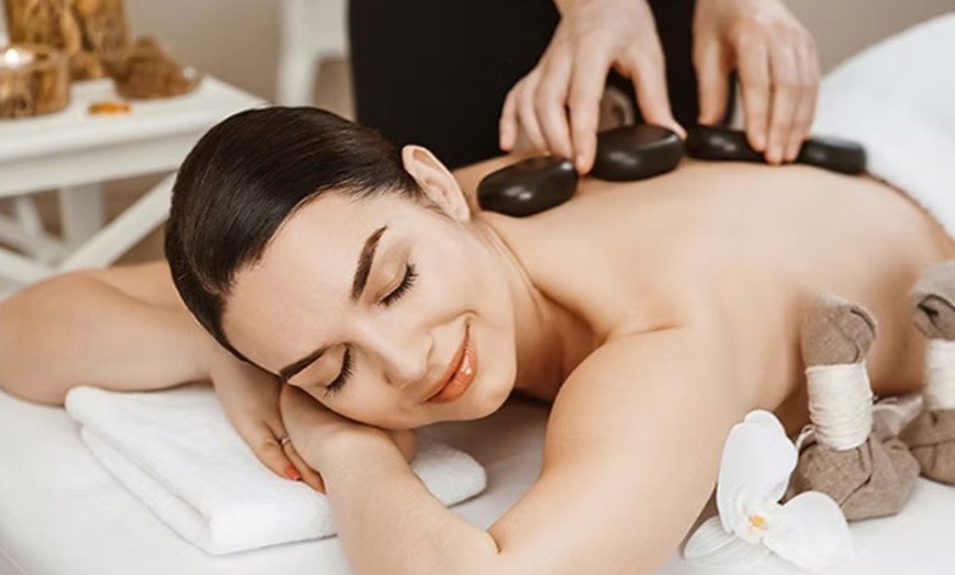 Image 1: 60 Minute Hot Stone Body or Foot Massage at Zen Day Spa Folsom