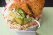$25 or $50 Towards Food and Drink or Full/Half Sandwich + Chips or Fries & More @ Schnitzi (Up to  27% Off) - Second Medium