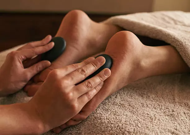 60-Min Foot Reflexology & Back Session w/ Foot Bath & Hot Stones