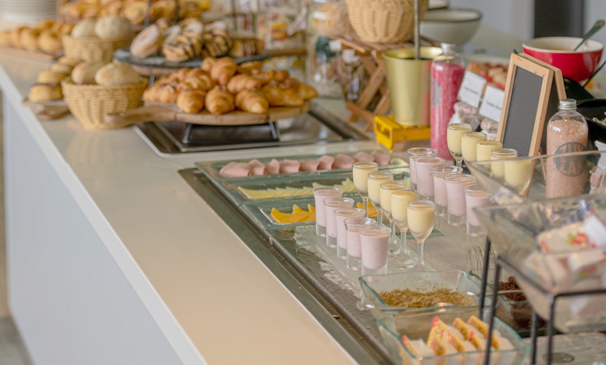 Image 4: Breakfast Buffet with Free-Flowing Coffee & Juices for All
