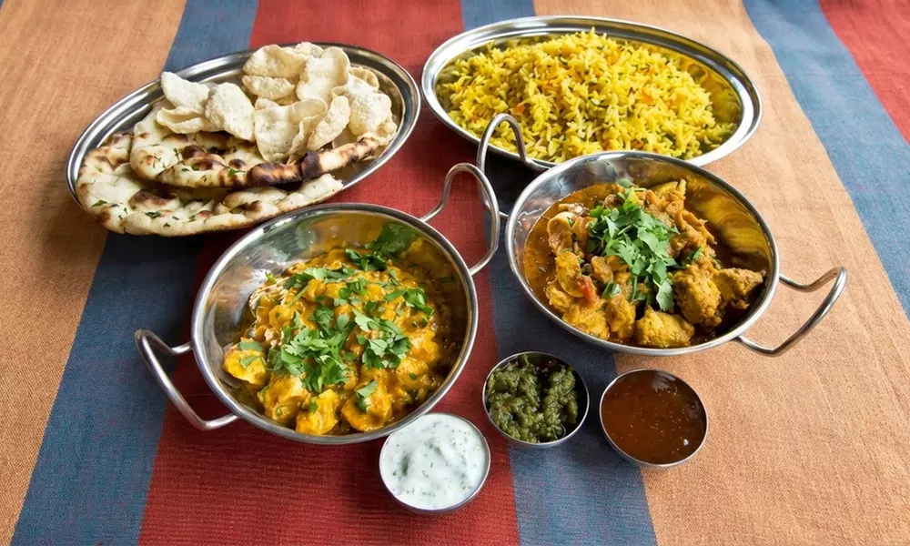 Three Course Indian Meal with Bottle of Wine for Two or Four People