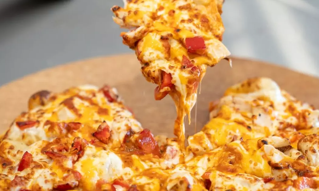 Credit to Spend on Food and Drinks or Large Signature/Classic Pizza