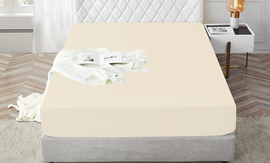 Image 5: Sábana bajera con esquinas