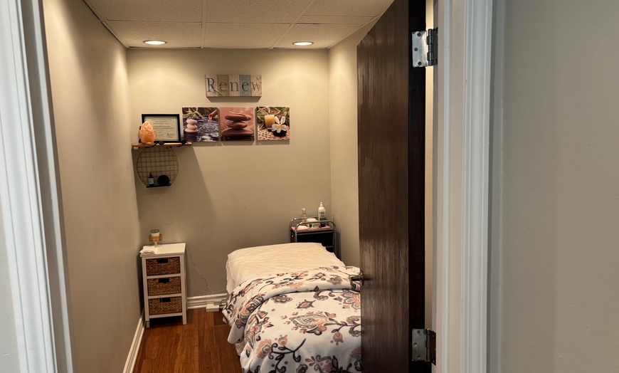 Image 1: 60 or 90-min Swedish, Hot Stone Massage, or Holiday Pampering Package