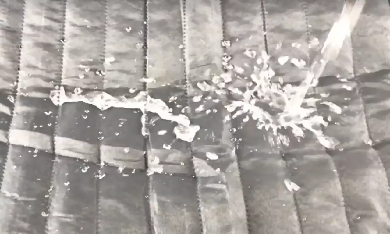 Housse de canapé matelassée bicolore