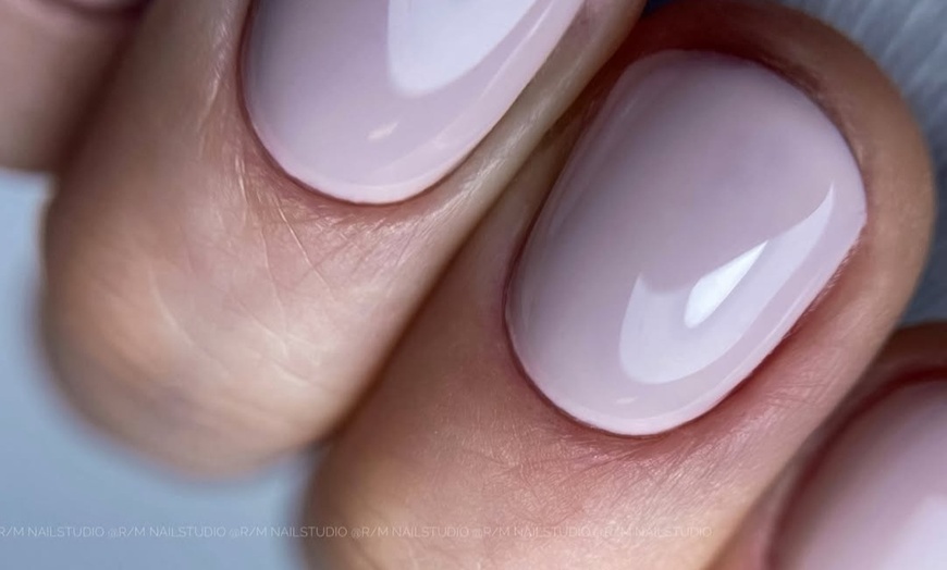 Image 6: Relax with a Deluxe Manicure and Pedicure Experience!