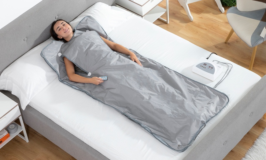 Image 1: Manta eléctrica con efecto sauna, de Innovagoods