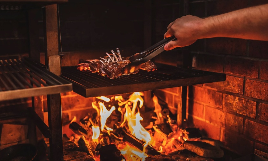 Image 4: Enjoy Dry Aged Sirloin with Sides and Wine for Two or Four Guests