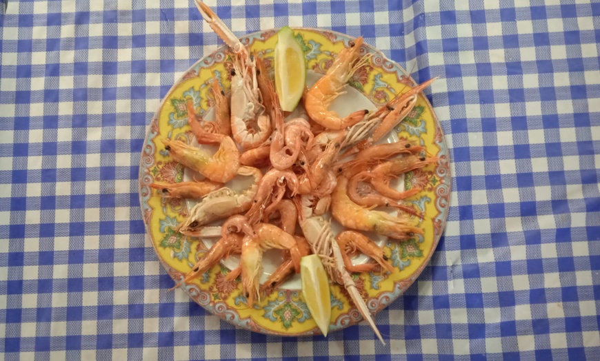 Image 5: Menú Premium de arroz con langosta y marisco con entrantes y vino 