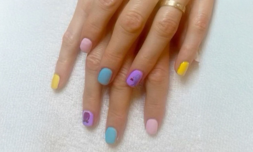 Image 2: Classic & Blossom Gel Manicure–Pedicure Packages for One or Two