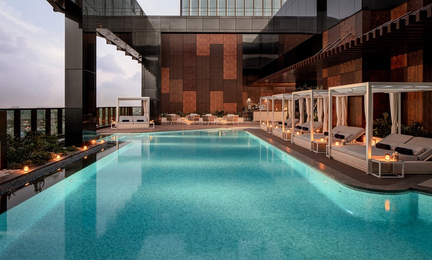 Image 1: Enjoy Pool Access with Food and Beverage Credit for 1, 2, or 4 Adults