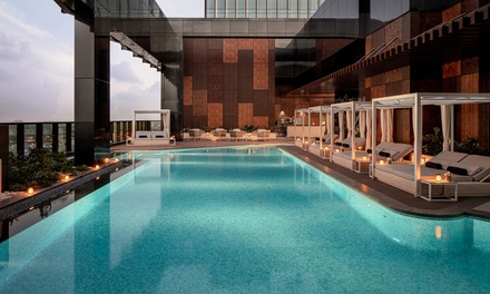 For One Adult: SunGlo 19 Pool Access with AED 80 Food and Beverage Credit