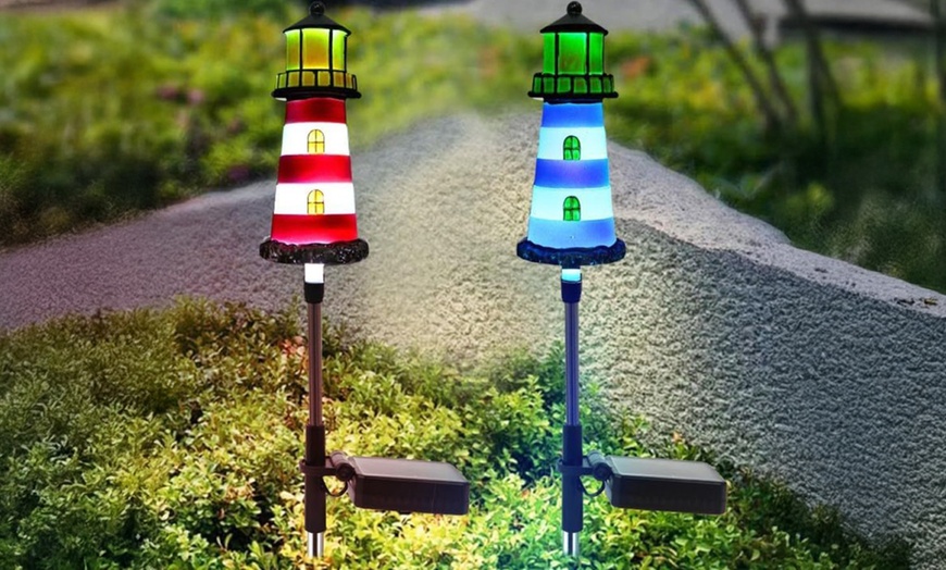 Image 1: One, Two or Four Solar Powered Lighthouse Shaped Garden Lights