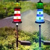 Image 1: One, Two or Four Solar Powered Lighthouse Shaped Garden Lights