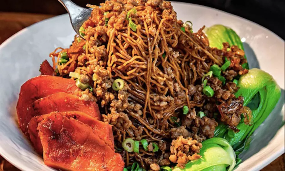 Savor $50 Dining Credit or Dinner with Cocktails for Two or Four