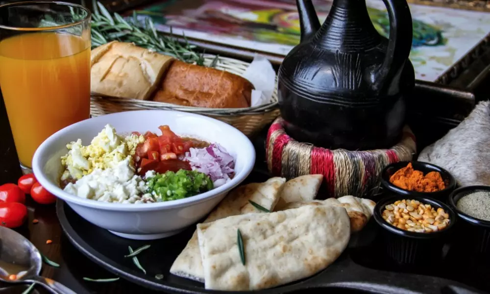Ethiopian Food and Drink for Dine-In or Carryout from Desta Ethiopian Kitchen. Two Options Available. - Primary Image