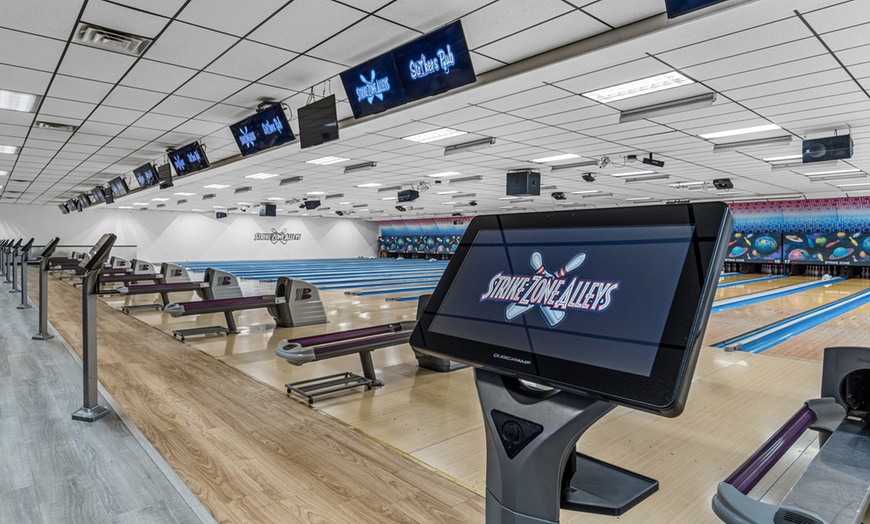 Image 3: Discounted Arcade Games Credits for Nonstop Fun at Strike Zone Alleys
