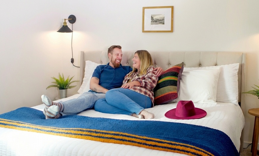 Image 8: Relax by the pool with lake views and mountain breezes