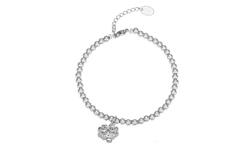 Image 3: Busta natalizia con braccialetto quadrifoglio e 4 set di orecchini