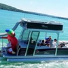 Image 1: Up to 26% Off Lake Austin Captained Pontoon Boat Rentals