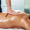 Image 2: Unwind with One 60 or 90 Minute Hot Stone or Coconut Oil Massage 