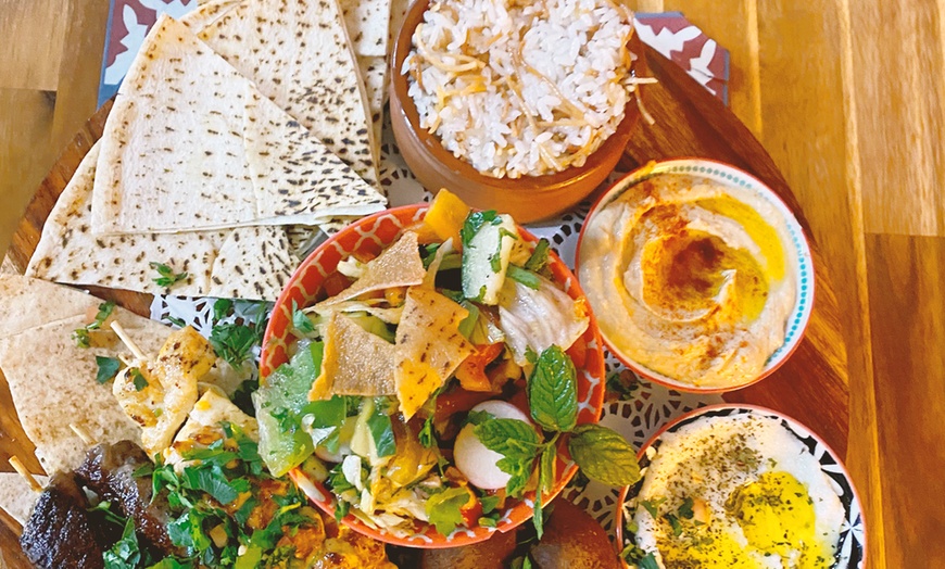 Image 1: Indulge into Delicious Dining Options: Grill or Vegetarian Feast