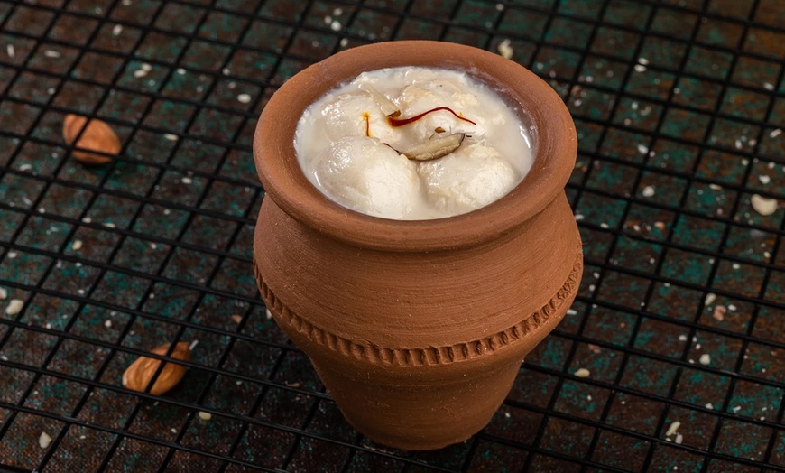 Image 11: Voucher Worth AED 100 or AED 150 to Spend on Anything Off the Menu 