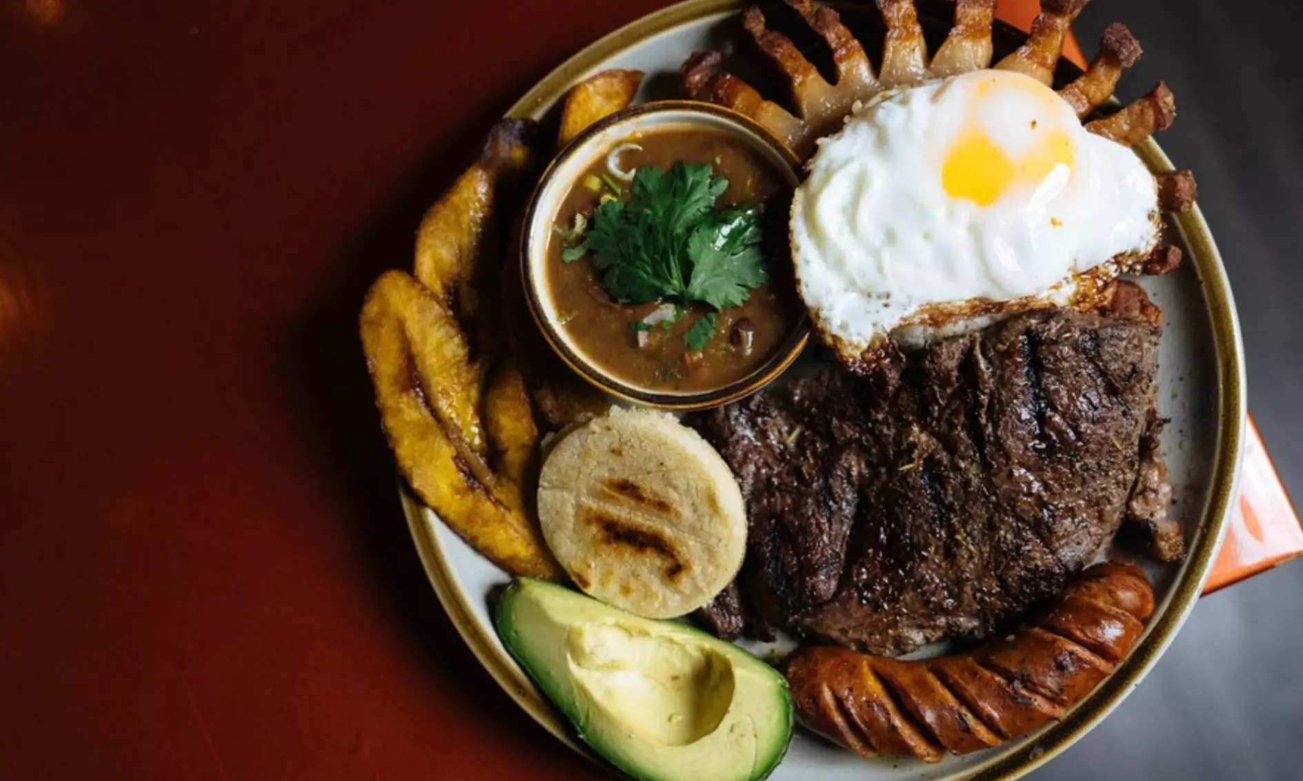 $25 or $50 General Spend Credit Toward Caribbean Food