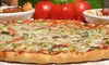12" or 16" Thin Crust Pizza with One Topping & Dough Dippers at Travinos Pizza Up To  46% Off