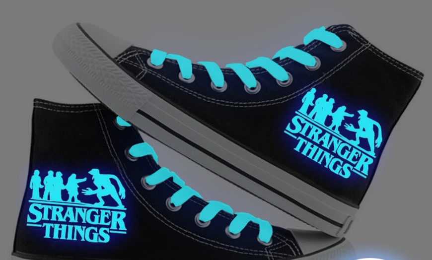 Image 7: Stranger Things Inspired Glow-in-the-Dark High-Top Trainers
