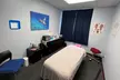 60 or 90-Minute Massage with Laser Therapy or Spinal Decompression Session and Consultation ( Up to 61% Off ) - Second Medium