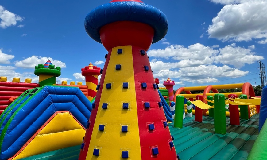 Image 1: Up to 36% Off Admission to Massive Inflatable Park at JoyJumps
