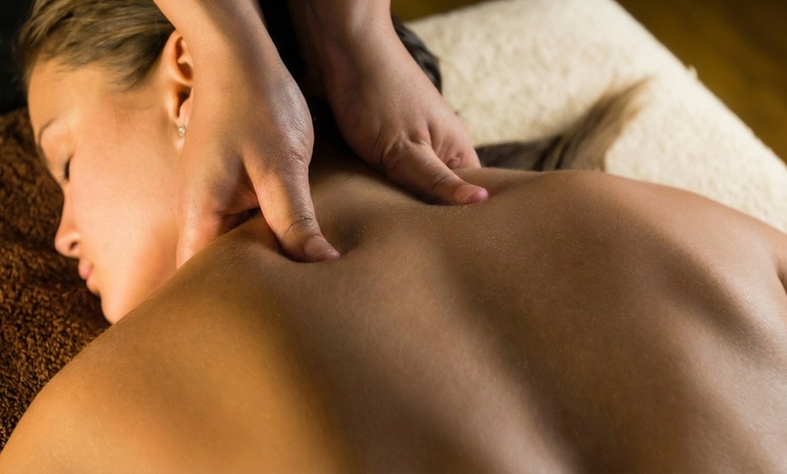 Image 2: 60-Min Hot Stone or Deep Tissue Massage w/ Optional 15-Min Foot Scrub