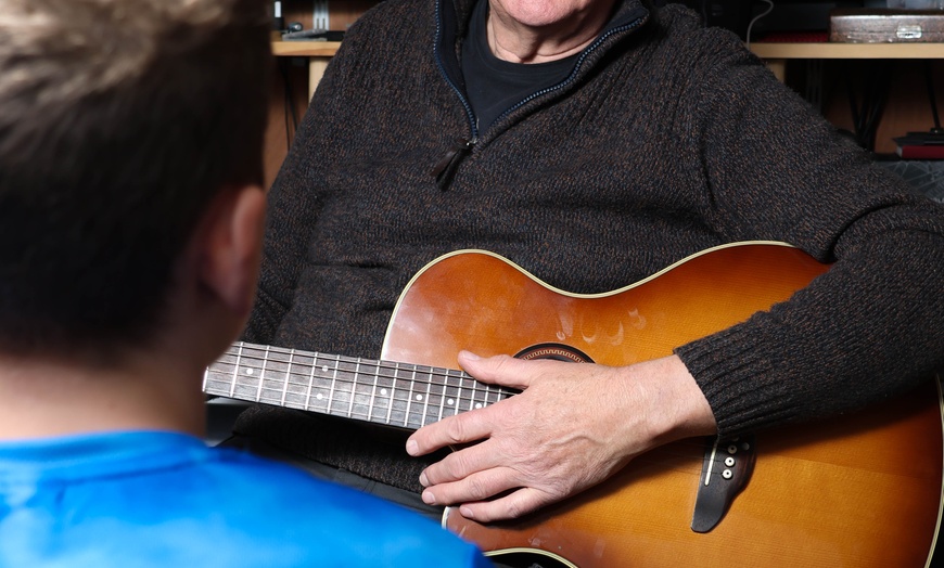 Image 3: Strum Your Way to Stardom: Unlock Your Inner Rockstar