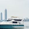 Image 2: 1.5 Hours Shared Marina Canal Yacht Tour for One Child or Adult