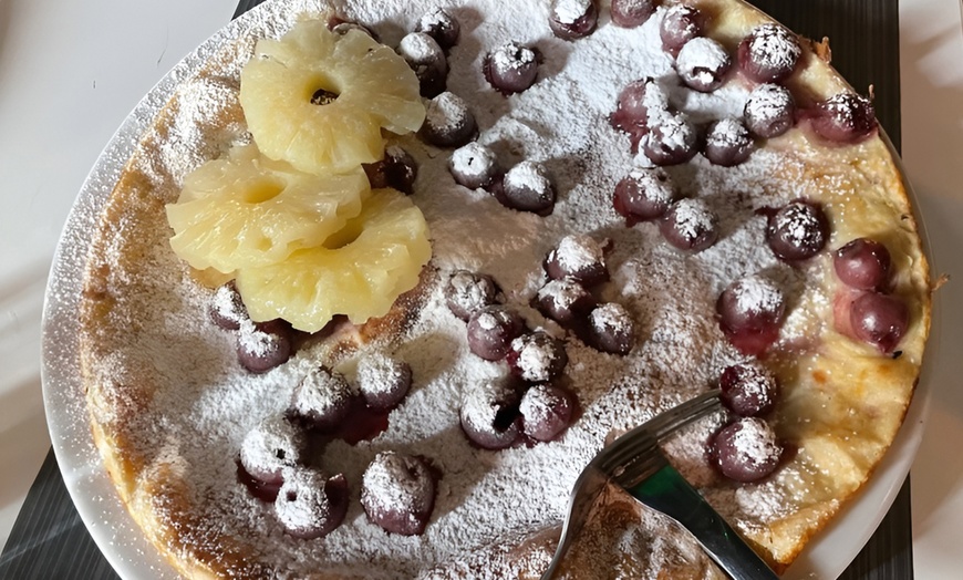 Image 10: Knapperige kipschnitzels in een knus pannenkoekenhuis
