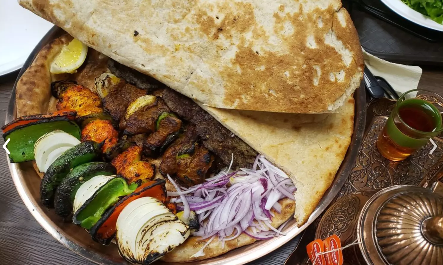 $30 or $60 Toward Food and Drink for Takeout or Dine-In at Kabul West Restaurant (33% Off) - Primary Image