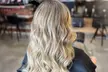 Haircut & Deep Condition w/ Optional Scalp Massage or Brazilian Blowout at The Beauty Room (Up to 50% Off) - Second Medium